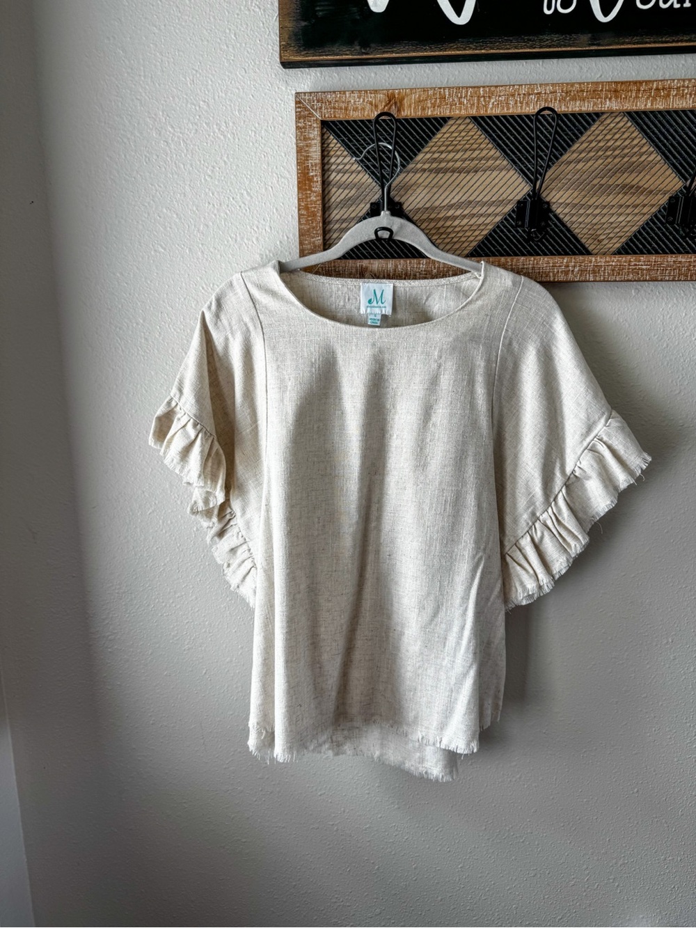The Mint Julep Cream Ruffle Sleeve Blouse